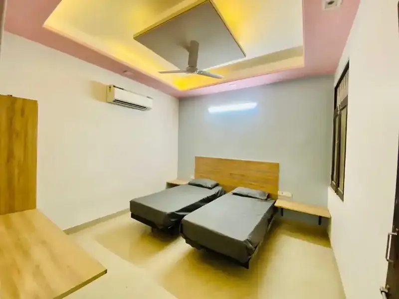 Twin sharing AC room with attached washroom at A-31 Girls PG, Ramnagariya Road, Jagatpura